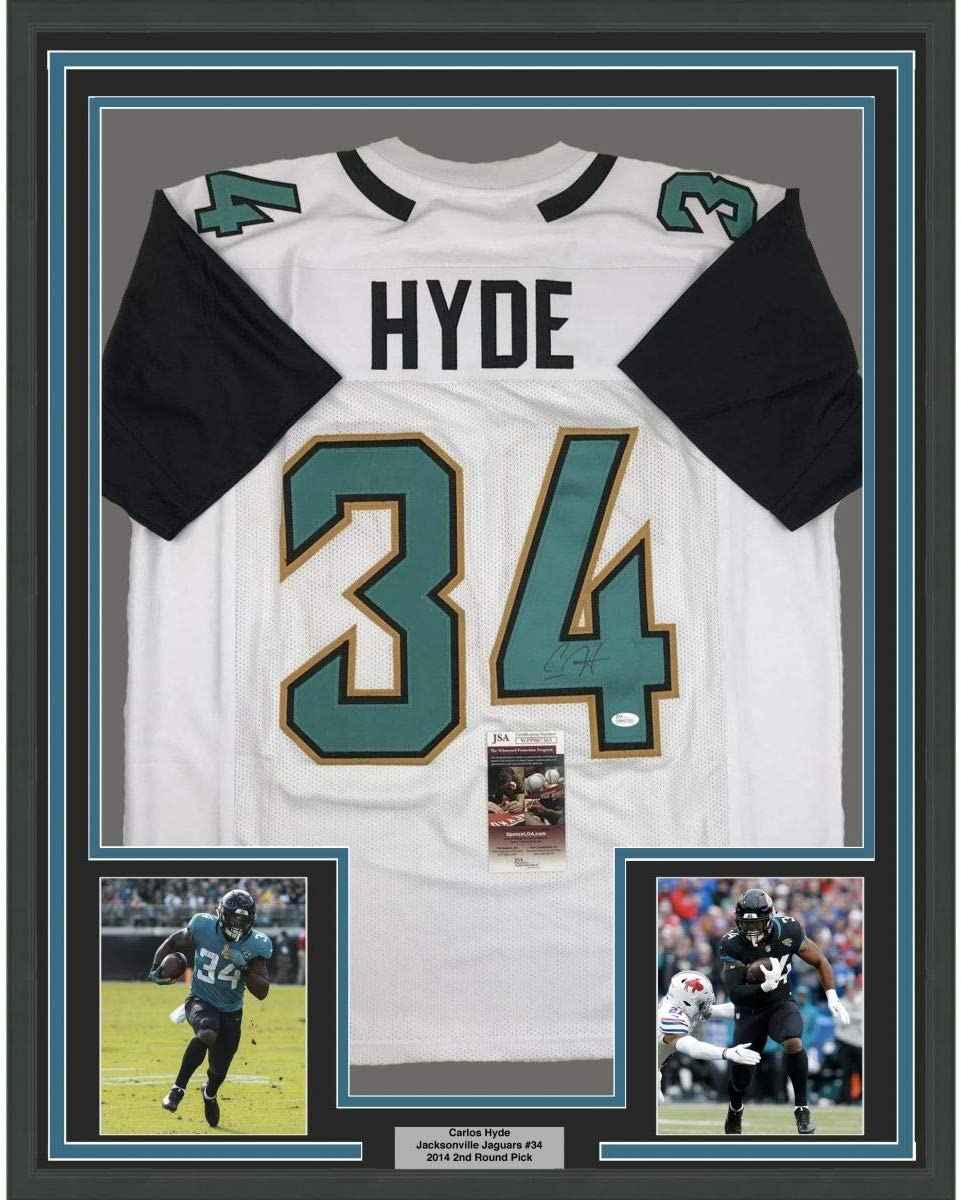 Framed Autographed/Signed Carlos Hyde 35x39 Jacksonville White Football Jersey JSA COA