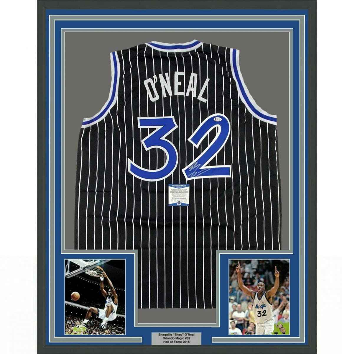 Framed Autographed/Signed Shaquille Shaq O'Neal 35x39 Orlando Black Pinstripe Basketball Jersey Beckett BAS COA