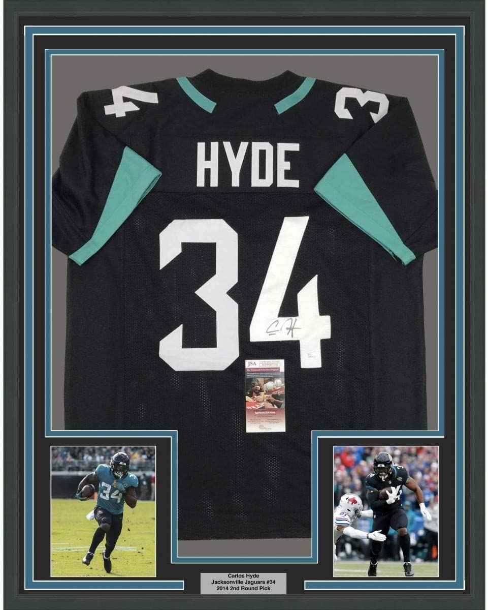 Framed Autographed/Signed Carlos Hyde 35x39 Jacksonville Black Football Jersey JSA COA