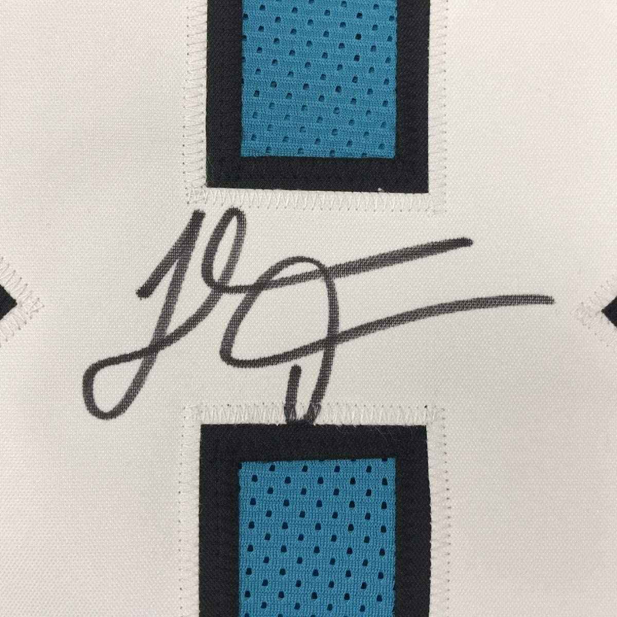 Autographed/Signed Thomas Davis Sr. Carolina Blue Football Jersey JSA COA