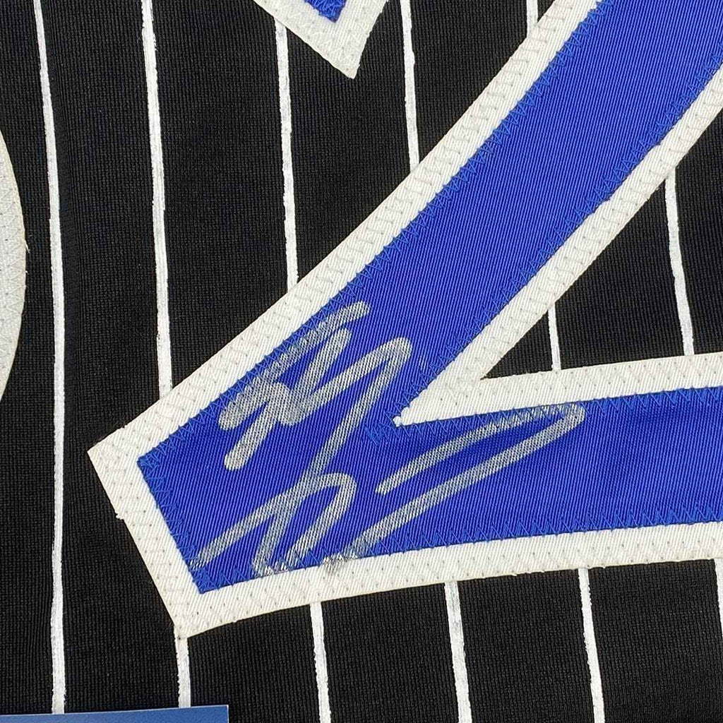 Framed Autographed/Signed Shaquille Shaq O'Neal 35x39 Orlando Black Pinstripe Basketball Jersey Beckett BAS COA
