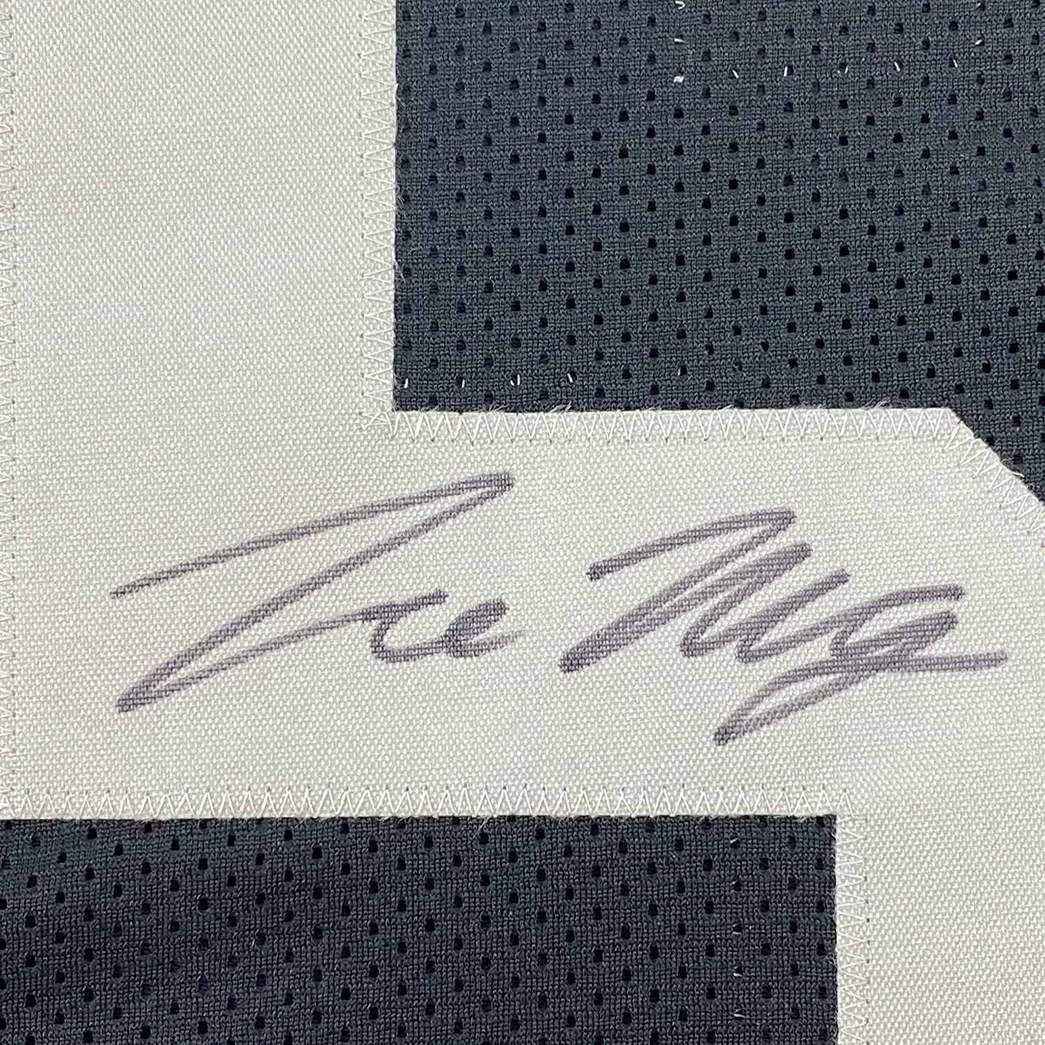 Framed Autographed/Signed Trevon Moehrig 35x39 Las Vegas Oakland Black Football Jersey JSA COA