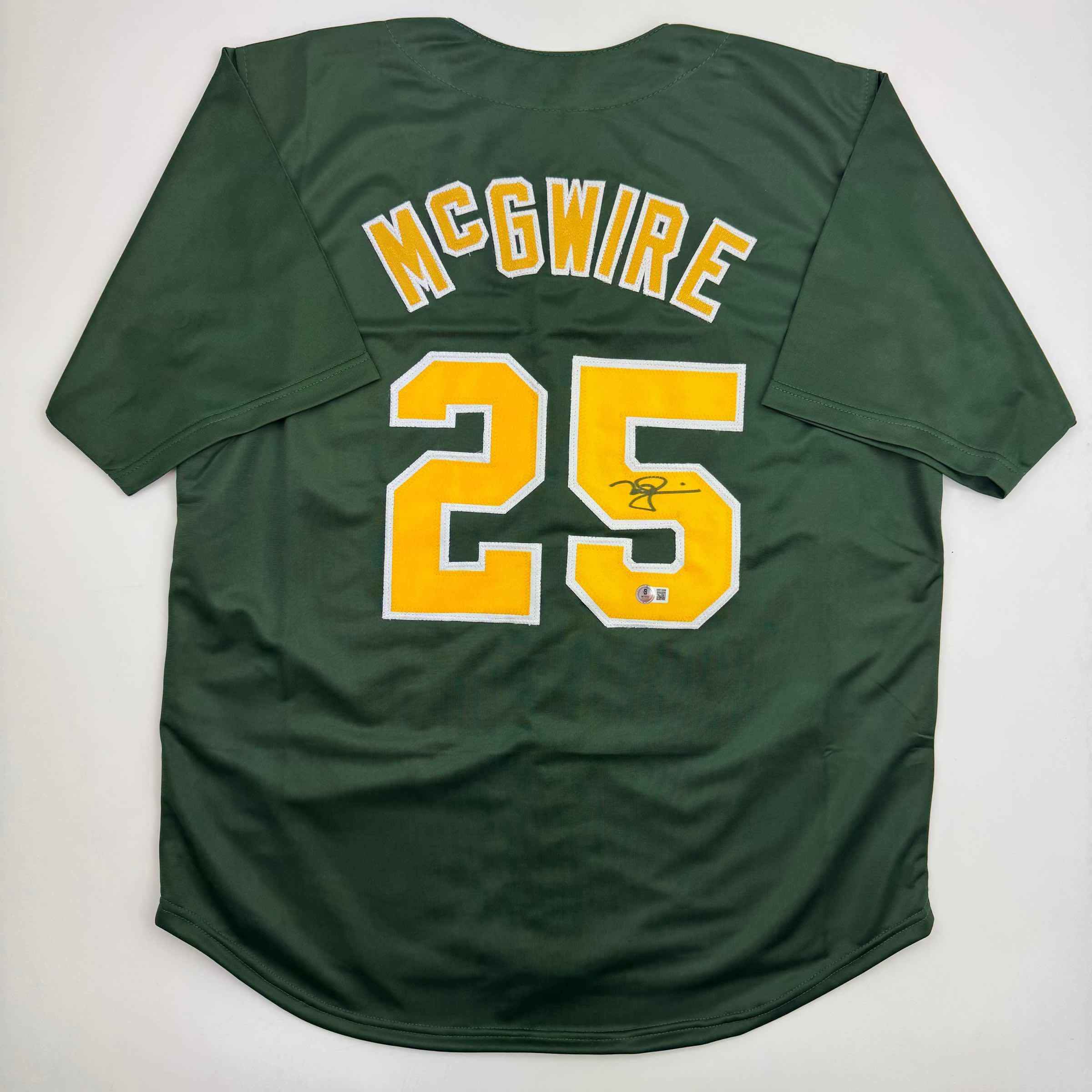 Autographed/Signed Mark McGwire Oakland Green Baseball Jersey Beckett BAS COA