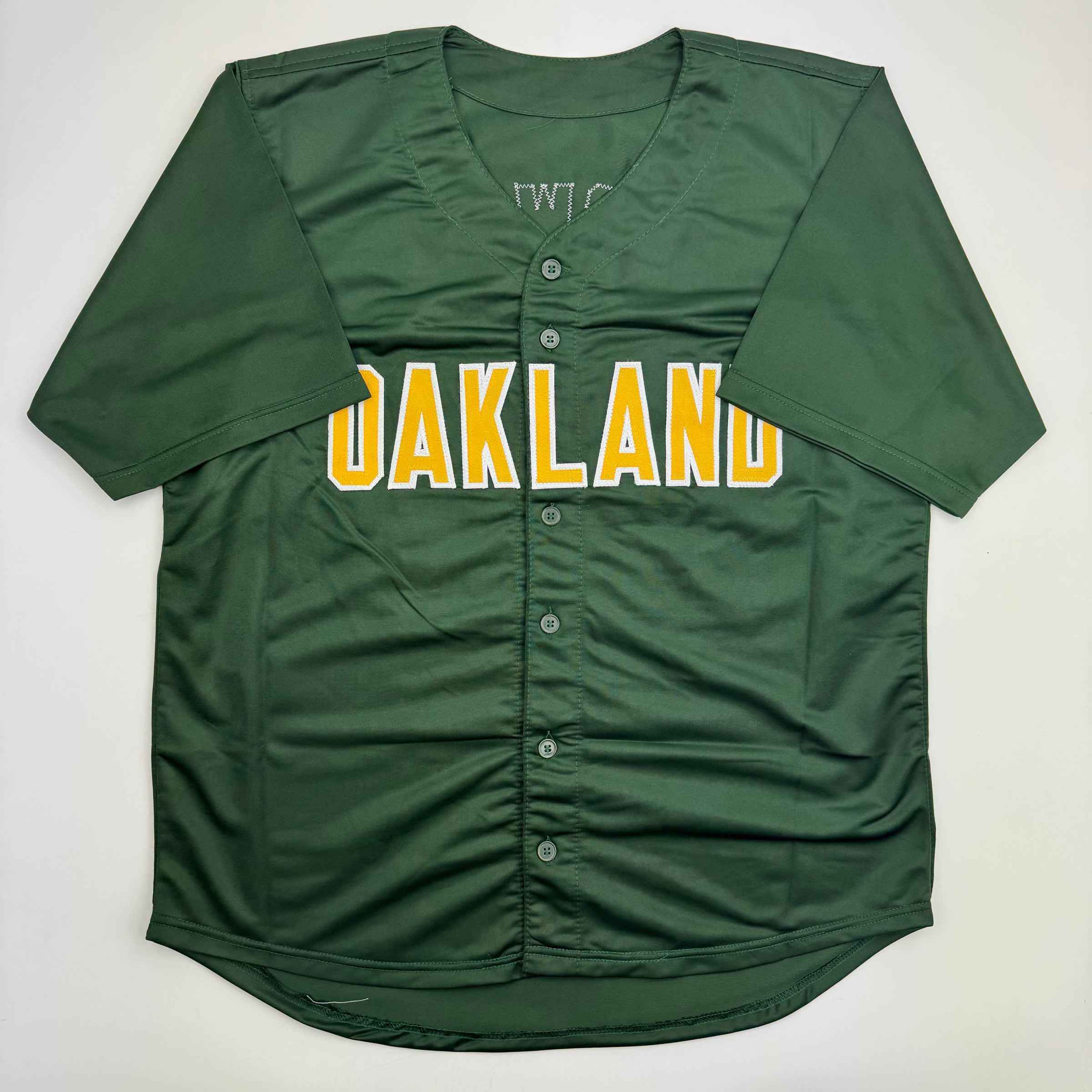 Autographed/Signed Mark McGwire Oakland Green Baseball Jersey Beckett BAS COA