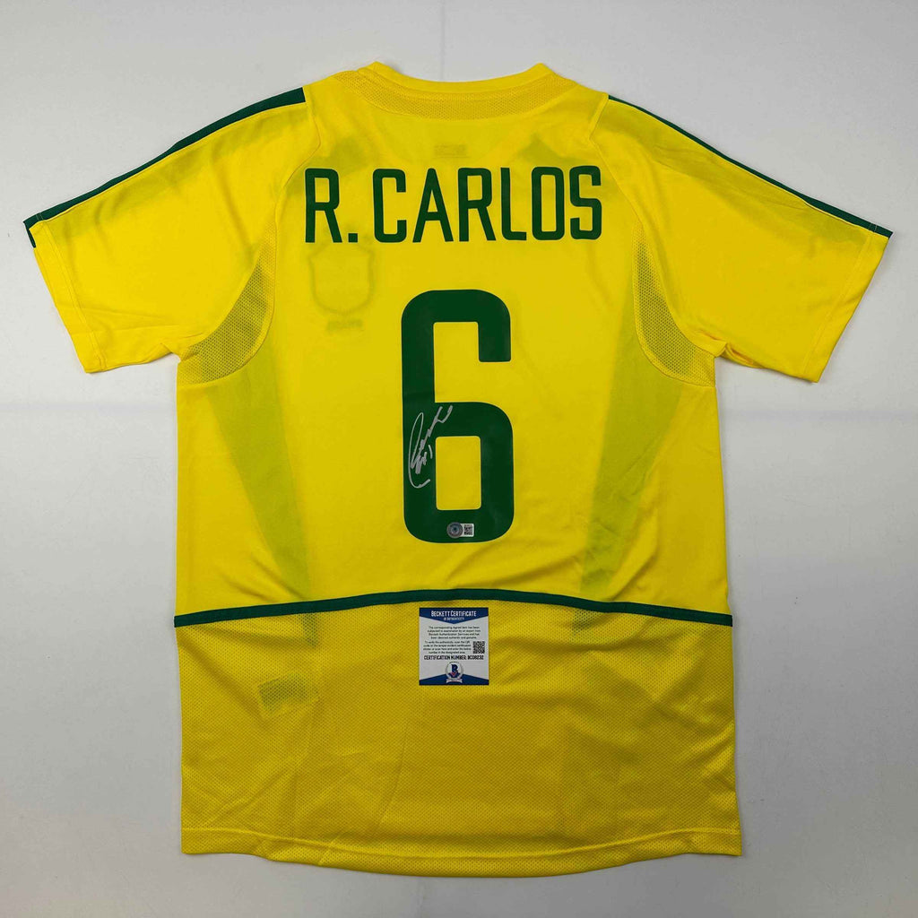 Autographed/Signed Roberto Carlos Brazil Yellow Soccer Jersey Beckett BAS COA