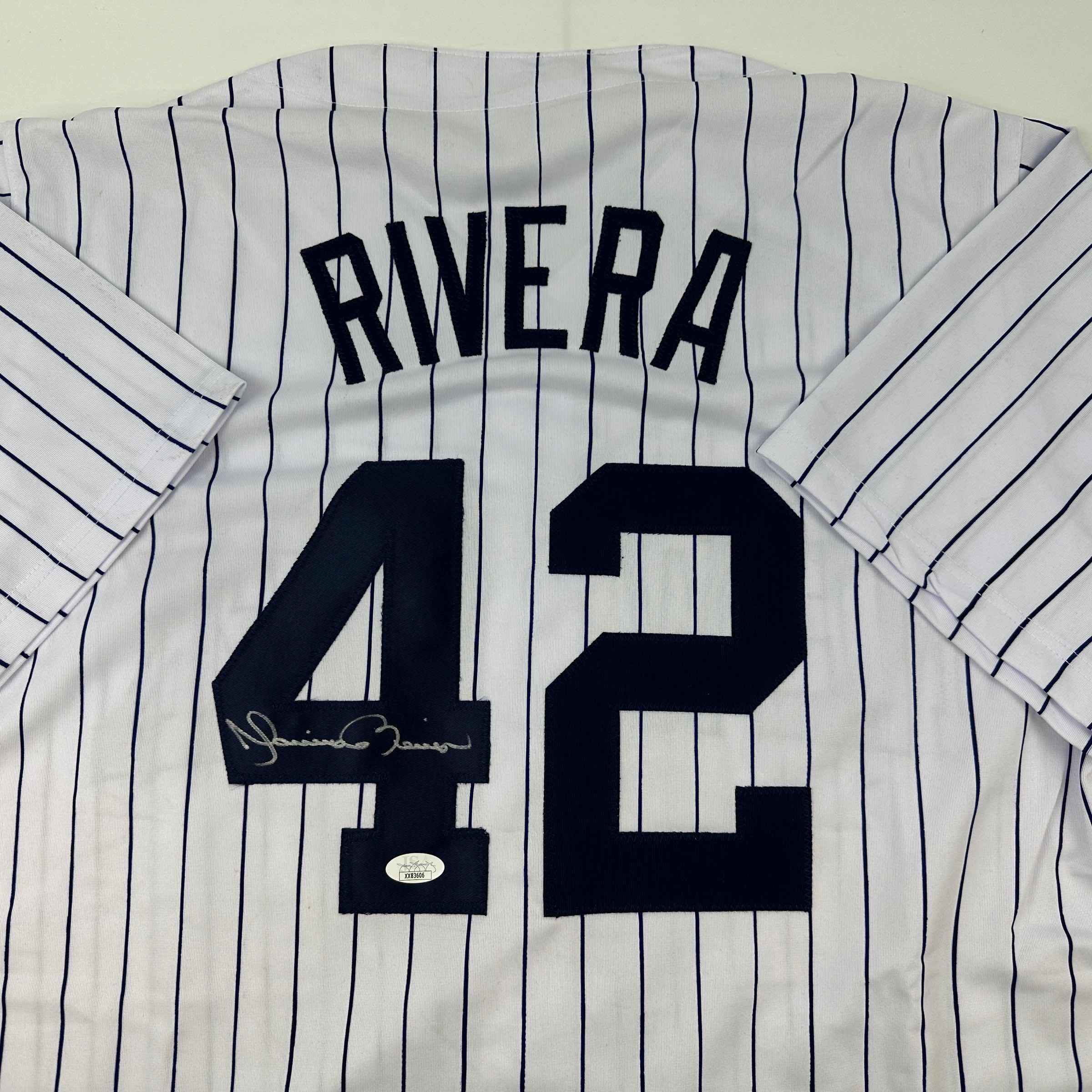 Autographed/Signed Mariano Rivera New York Pinstripe Baseball Jersey JSA COA/LOA