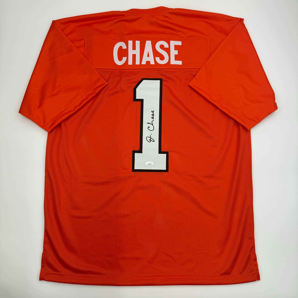 Autographed/Signed Ja'Marr Chase Cincinnati Orange Football Jersey JSA COA