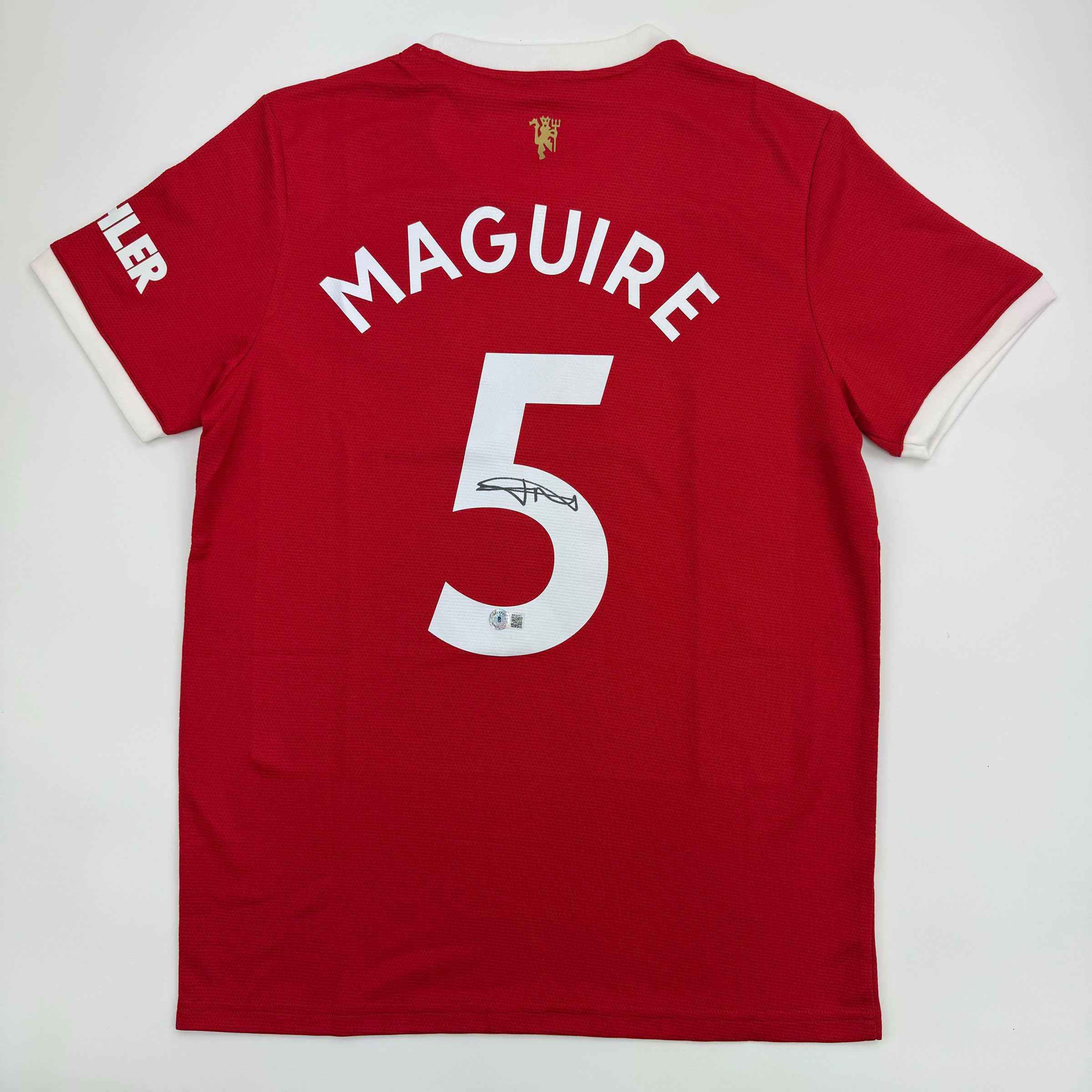 Autographed/Signed Harry Maguire Manchester United Red Soccer Jersey Beckett BAS COA