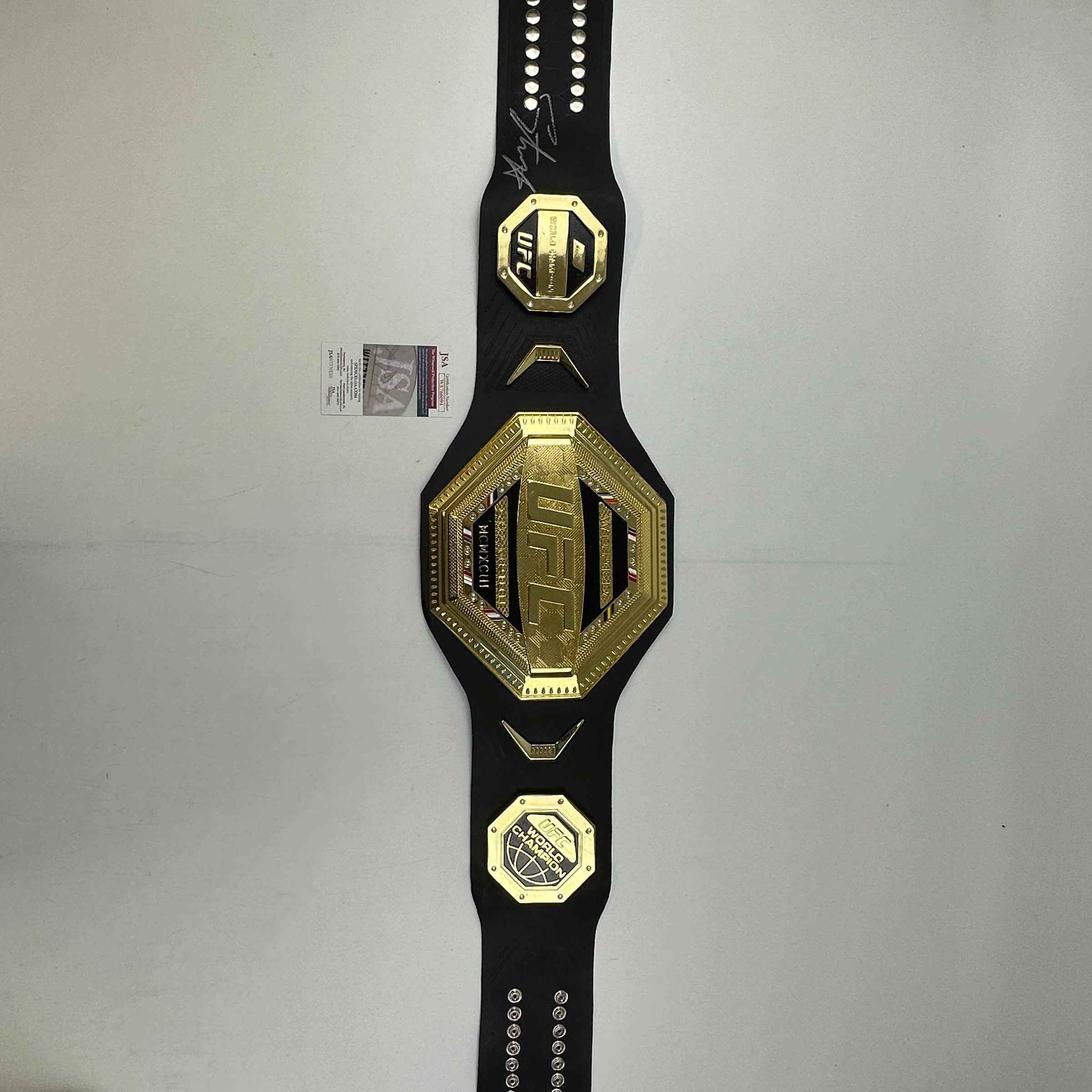Autographed/Signed Israel Izzy Adesanya Black Replica UFC Championship Title Belt JSA COA