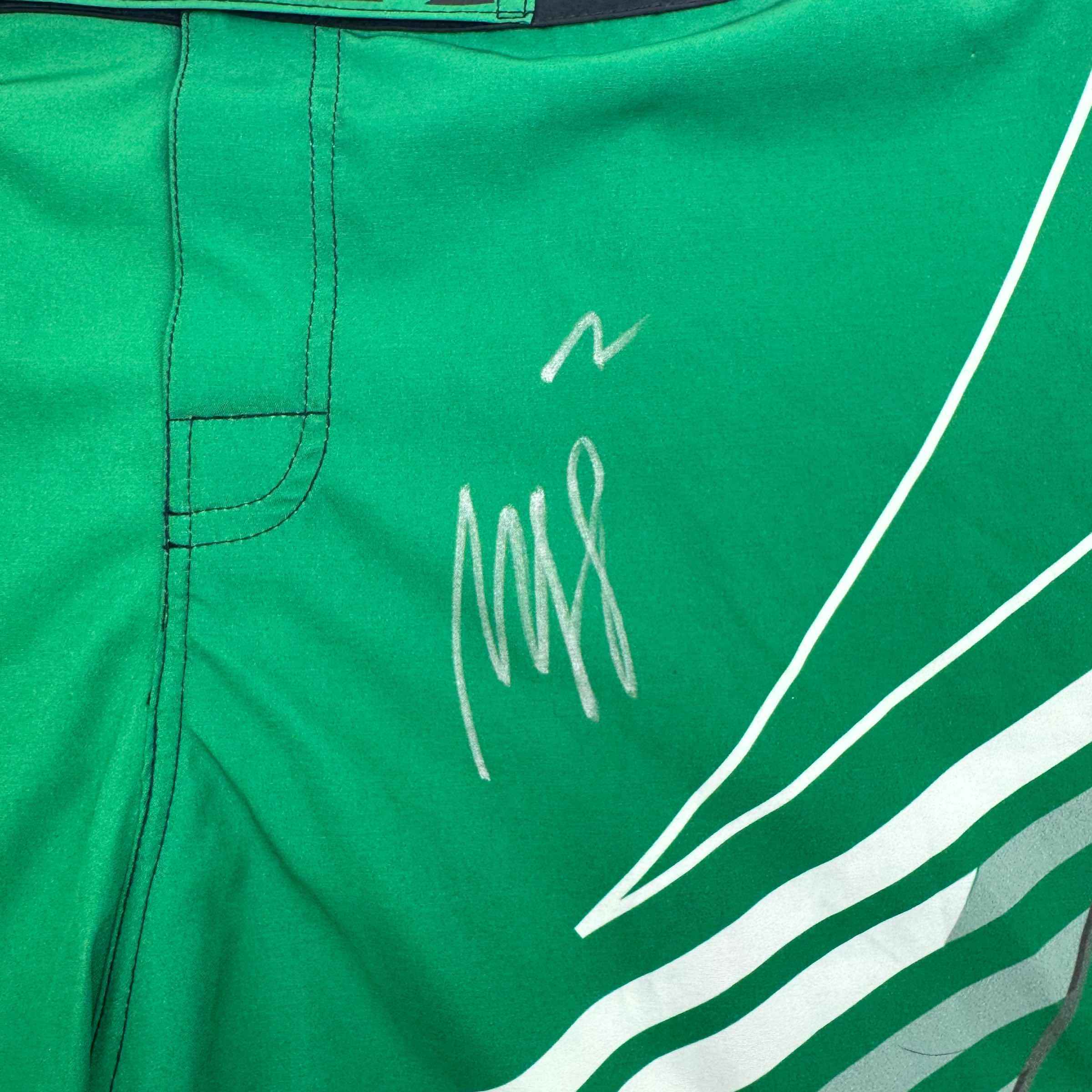 Autographed/Signed Khamzat Borz Chimaev Venom UFC MMA Ultimate Fighting Green Trunks PSA/DNA COA