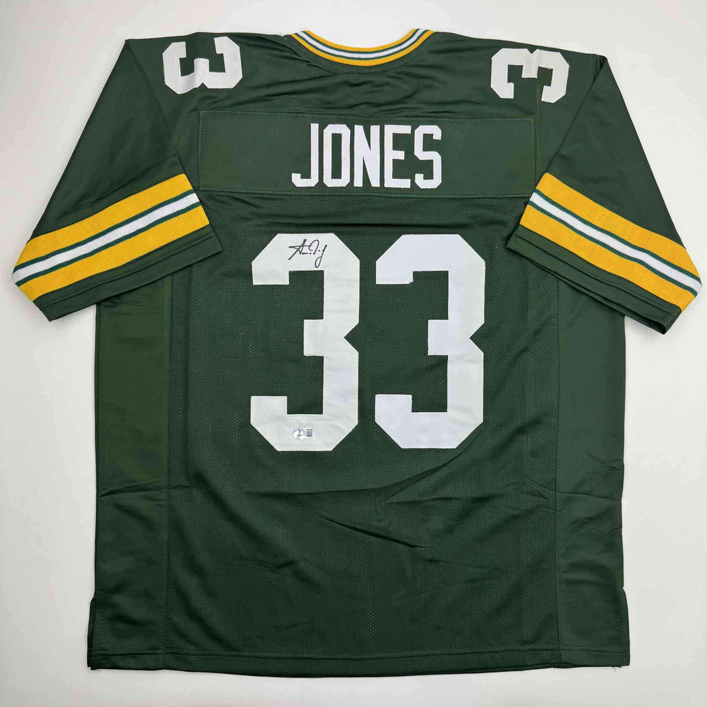 Autographed/Signed Aaron Jones Green Bay Green Football Jersey Beckett BAS COA