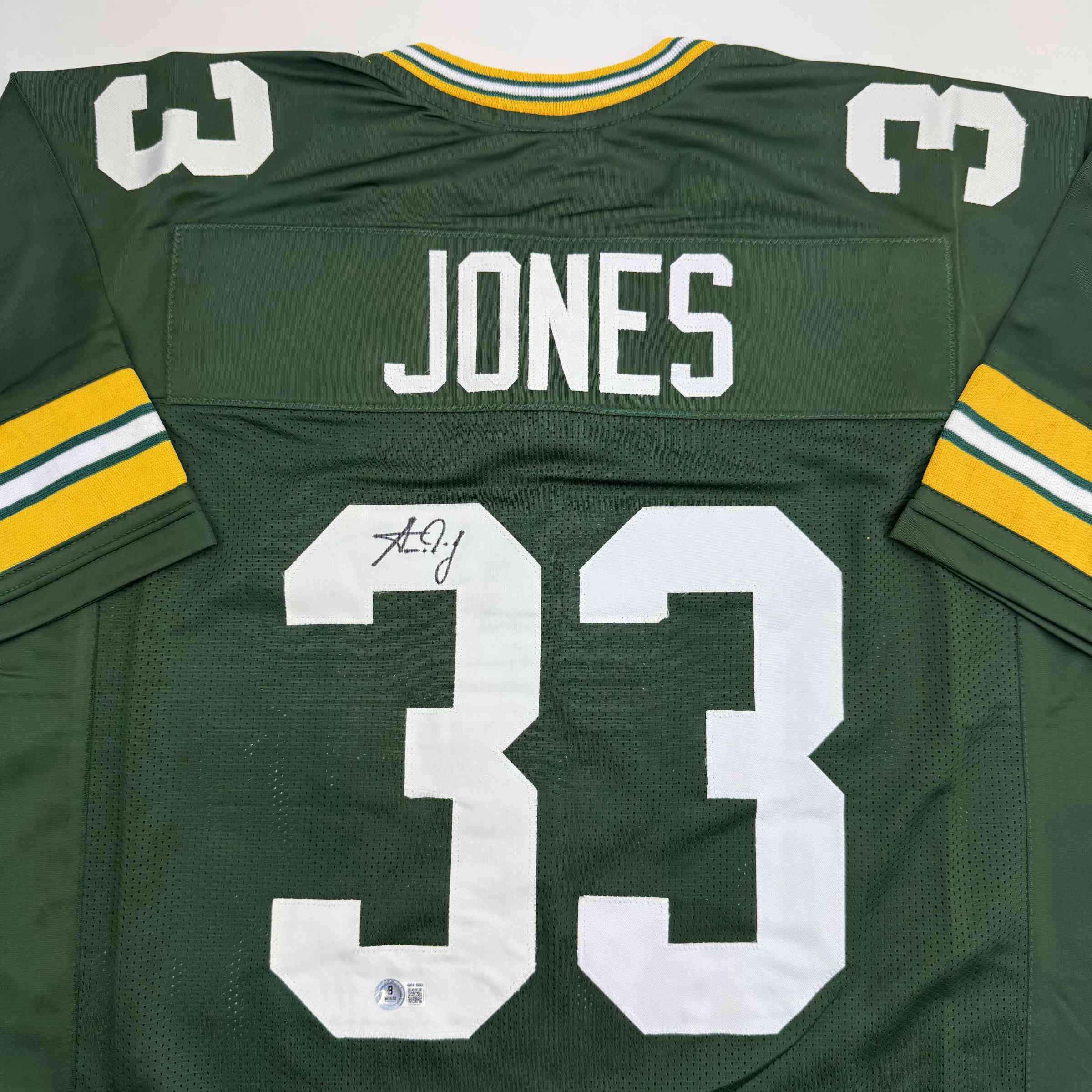Autographed/Signed Aaron Jones Green Bay Green Football Jersey Beckett BAS COA