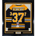 Framed Autographed/Signed Patrice Bergeron 35x39 Boston Black Hockey Jersey JSA COA
